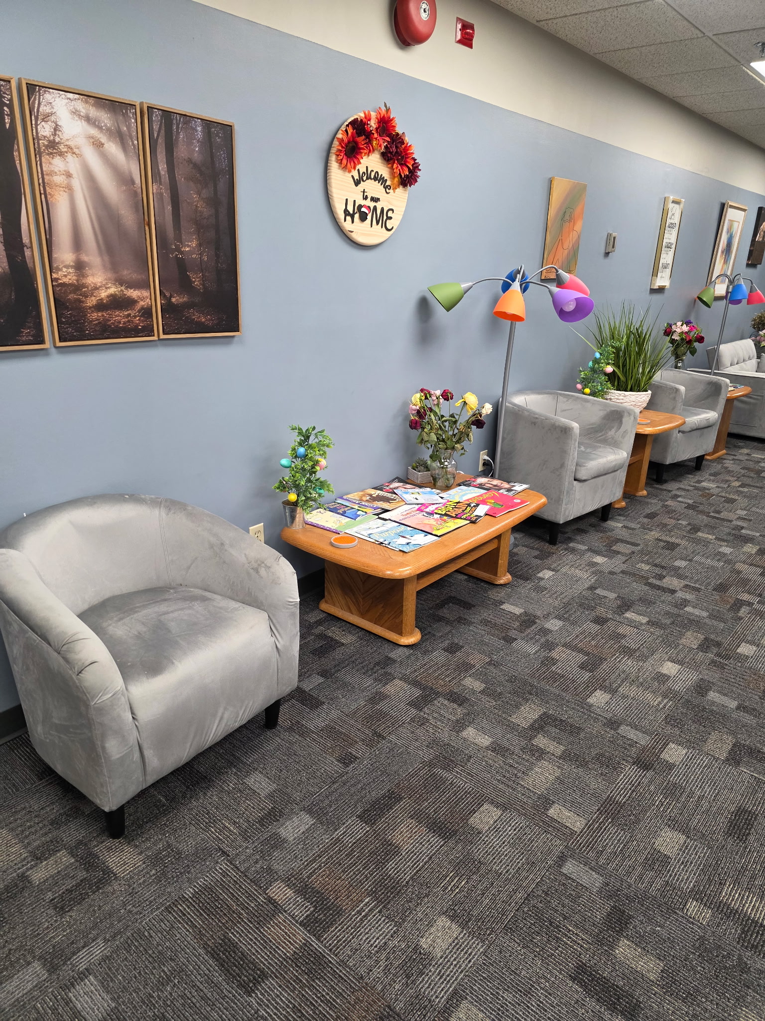 Comfortable waiting area with seating and warm decor